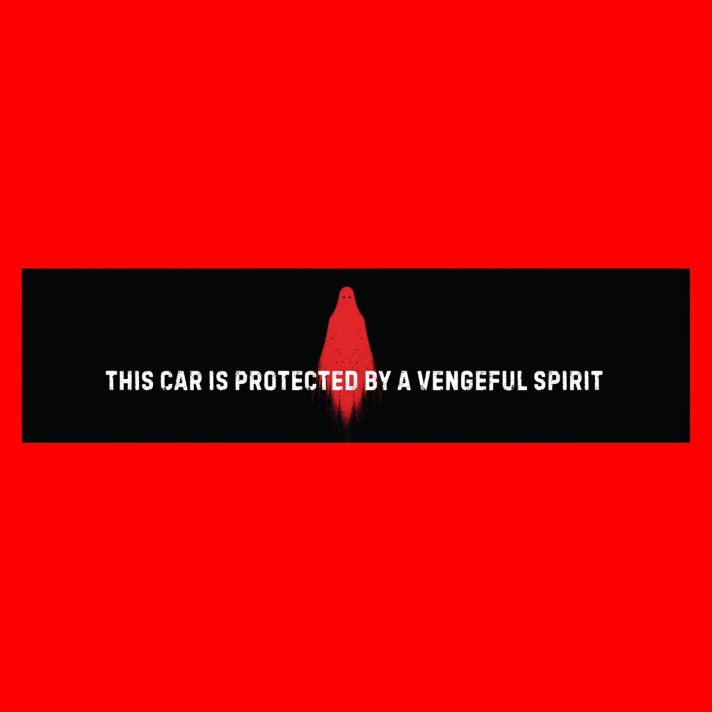Sticker with red silhouette and text 'This car is protected by a vengeful spirit' on a black background