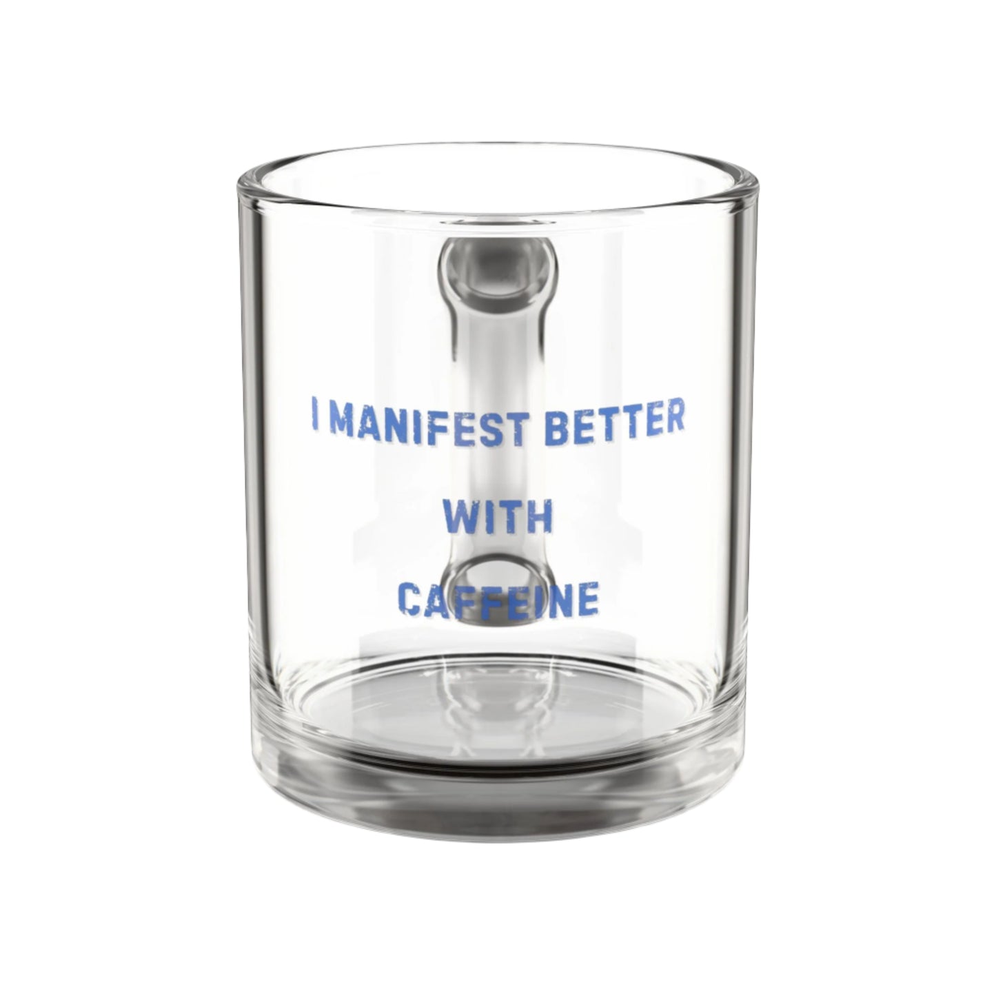 Clear glass mug with blue text 'I Manifest Better with Caffeine' on a white background